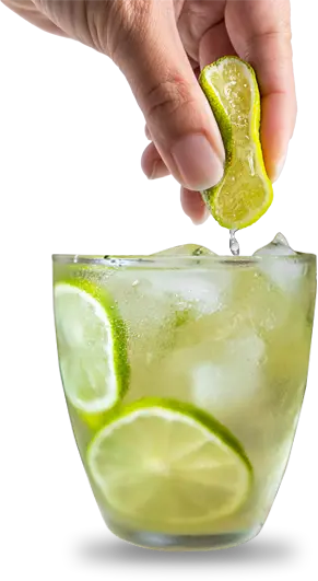 Squeezing Lime In Glass